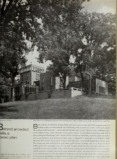 an old black and white photo of a house in the middle of a field with trees