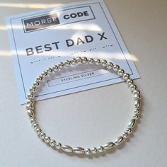 Men's Sterling Silver Bracelet with a hidden message written in Morse Code dots and dashes. This sterling silver morse code stretch bracelet makes a lovely gift to remember and re-live special holiday memories, the place where you first met, a proposal or a wedding etc or a secret message for a special Dad, Boyfriend or Husband. Your message will be secretly written in Morse Code dots and dashes so that it is known only to the wearer and will evoke memories of a special time whenever they glance Mens Sterling Silver Bracelets, Code Morse, Mens Bracelet Personalized, Memorial Bracelet, Morse Code Bracelet, Hidden Message, Secret Messages, Morse Code, Men's Bracelet