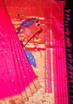 Paithani sarees are a quintessential part of Indian heritage, renowned for their exquisite craftsmanship and intricate designs. Originating from the town of Paithan in Maharashtra, India, these sarees are characterized by their rich silk fabric, vibrant colors, and ornate motifs This Hot Pink Hued saree comes with dainty buttas on the body and Single Muniya Borders that frame both edges. A gorgeous triple peacock design is featured in the pallu. Handwoven to beauty and opulence, this saree truly is a treasure to drape and own! SILK MARK CERTIFIED This saree is ready to wear with fall and pico done. Handmade silk tassels adorn the pallu and add more grace to it. An unstitched blouse fabric is included. *Note: There may be minor variations in the shade, the texture of the product. Hues/textu Yeola Paithani, Paithani Sarees, Silk Tassels, Indian Heritage, Peacock Design, Intricate Designs, Handloom Saree, Blouse Fabric, Silk Fabric