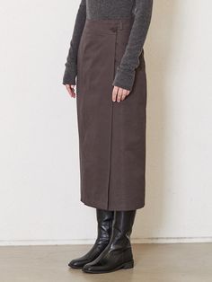 Composition : cotton 100Color : BrownCountry of Origin : Republic of Korea Brown Cotton Long Skirt, Brown Cotton Skirt For Fall, Long Brown Cotton Skirt, Fitted Brown Cotton Skirt, Relaxed Fit Brown Cotton Skirt, Brown Long Cotton Skirt, Brown Asymmetrical Skirt For Workwear, Brown Asymmetrical Skirt For Work, Cotton Asymmetrical Skirt For Work