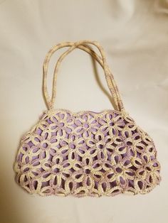 "Beautiful purse for macrame lovers, it has a beautiful flower pattern Unique style Dimensions: 13\" x 9\" PLEASE CONTACT FOR ANY QUESTIONS! FINAL SALE, NO RETURNS, NO EXCHANGES!" Purple Shoulder Bag With Braided Handles, Purple Tote Shoulder Bag For Spring, Casual Handmade Purple Shoulder Bag, Handmade Bohemian Purple Crochet Bag, Handmade Purple Crochet Bag For Everyday, Spring Natural Macrame Shoulder Bag, Handmade Purple Crochet Bag For Daily Use, Purple Crochet Bag For Everyday Spring Use, Purple Bohemian Bags For Spring