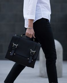 "Bag. Link to the bags section - https://www.etsy.com/shop/Pikore?ref=shop_sugg&section_id=24287075 Looking for a satchel bag that will be spacious enough to carry your laptop but simple and elegant in design? A leather women laptop bag is an ideal solution to meet your demands. MAIN CHARACTERISTICS: - Sizes: 🔸 The bag is made according to the dimensions of your laptop. (Please, leave your laptop dimensions in the Notes box at the checkout page). - Pockets:   Front internal:  🔸 Smartphone pocket;  🔸 2 pen holders;  🔸 3 slots for cards.   Backside internal:  🔸 Zip pocket;  🔸 Plain pocket - 20 x 12 cm (7.8 x 4.7\"); - Flap messenger bag; - Hidden magnets closure; - False buckles; - Top handle; - Detachable shoulder strap 140 x 2.5 cm (55 x 1\"); - Brass or silver metal hardware to choo Work Bags Laptop, Messenger Bag Women, Leather Work Bag, Briefcase Women, Laptop Messenger Bags, Laptop Bag For Women, Black Leather Satchel, Bags Leather Handbags, Leather Laptop Bag