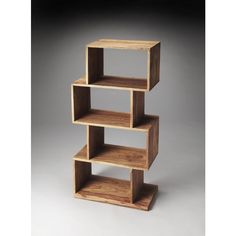 three wooden shelvings stacked on top of each other in the shape of cubes