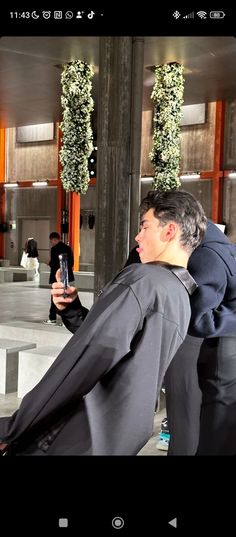 a man taking a selfie with his cell phone