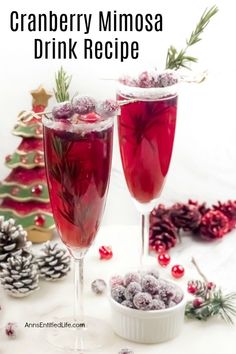 two glasses filled with cranberry mimosa drink