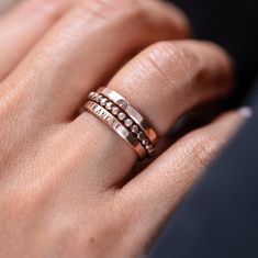 These skinny rose gold rings include a name ring, beaded ring, and rainbow ring and can be stacked in any order. This gorgeous set is now available in 14K rose gold filled, 14K yellow gold filled and .999 fine silver. It includes all three rings in the photo: -a 2mm name ring -a 2mm rainbow ring -a 2mm flat beaded ring These rings are individually made for you and no two are alike! Please see the photo for more information about gold-filled jewelry, as it is an affordable alternative to solid go Personalized Stackable Rings, Rose Gold Rings, Rainbow Ring, Stackable Ring Sets, Mom Ring, Name Ring, Rainbow Rings, Engraved Ring, Beaded Ring