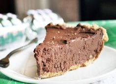 a piece of chocolate pie on a white plate