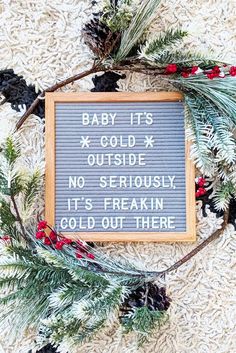 a sign that says baby it's cold outside and no seriously it's freakin cold out there