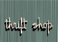 the word thrift shop written in white letters on a blue background with vertical stripes