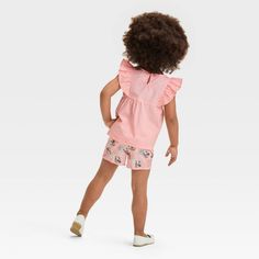 Fill their day with oodles of sweet style with this Disney Minnie Mouse Embroidered Seersucker Top and Shorts Set. This set includes a cap-sleeve top and pull-on shorts, both crafted from midweight fabric for comfortable wear. Designed in a pink hue with seersucker stripes, the crewneck top features an embroidered patch with Minnie Mouse on the front and cap sleeves, while the accompanying shorts feature seersucker stripes and an allover Minnie Mouse print for coordinated flair. Plus, the shorts Summer Cotton Minnie Mouse Sets, Minnie Mouse Cotton Summer Sets, Casual Pink Minnie Mouse Set, Playful Minnie Mouse Summer Set, Pink Minnie Mouse Sets For Spring, Cute Minnie Mouse Summer Sets, Spring Minnie Mouse Pink Sets, Spring Pink Minnie Mouse Sets, Seersucker Top