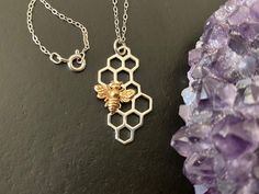 25% off if you buy 3 pieces , applicable to entire shop. Use  code 25off3  Beautiful 925 sterling Sterling Silver honeycomb pendant. Layer on the goodness in your jewelry designs with this sterling silver honeycomb pendant with bronze bee, and celebrate the profound connection between nature and geometry. Honey Bees are all about sweet indulgence, and achieving the impossible through hard work. They seek out the beauty in nature and transform it into honey. In so doing, honey bees teach us to fo Hexagon-shaped Silver Jewelry For Gift, Handmade Hexagonal Silver Jewelry, Handmade Hexagon Jewelry, Sterling Silver Hexagon Jewelry For Gift, Sterling Silver Hexagon Jewelry As Gift, Hexagon-shaped Sterling Silver Jewelry Gift, Hexagonal Sterling Silver Jewelry Gift, Silver Hexagon Necklace For Jewelry Making, Handmade Hexagon Necklace For Gift