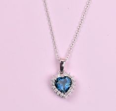 In Europe during the Renaissance (the period from the 1300s to the 1600s) people thought that topaz could break magic spells and dispel anger. For centuries, many people in India have believed that topaz worn above the heart assures long life, beauty, and intelligence. The Blue Topaz gemstone symbolizes love as well as fidelity. Blue Topaz originates from the old Sanskrit 'Tapas' meaning fire. This light blue transparent rock was named because of its power to cool hot water. ... This significance made topaz extremely effective gemstone of all times Gemstone: Premium Grade London Blue Topaz Stone Shape/ Size: Heart 7.0MM Metal Type: 925 Sterling Silver/ Solid14K Gold Also Available Finish Type:  In 925 Sterling Silver below Finish Types are Available: White Rhodium-Silver / 14K Yellow /14K Blue Topaz Heart Necklaces, Natural Stone Necklace, Blue Topaz Necklace, Topaz Necklace, Blue Topaz Stone, Natural Stones Necklace, Halo Pendant, Luck Charms, Magic Spells