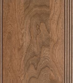 a close up view of the wood grains on this cabinet door, which has been made to look like it is being carved