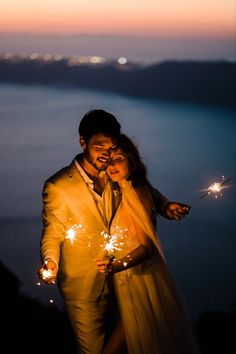 15 Beach Wedding Ideas Perfect for Your Big Day | Beach Wedding Inspo Pre Wedding Night Shoot Ideas, Marriage Photoshoot Wedding Photos, Sparkler Couple Photos, Sunset Pre Wedding Shoot, Diwali Couple Photography, Resort Photoshoot Ideas Couple, Diwali Couple Pics, Night Prewedding Photography, Resort Photoshoot Ideas