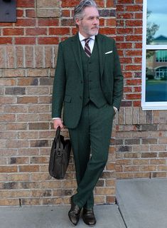 Draw a stroke of genius by pulling off our Highlander Melange Green Tweed Suit. Afterward, maintain a prestigious character with a pure wool cloth, which exhibits sturdy, soft, and evenly plush accents with gorgeous green hues. Also, with the help of precision tailoring, this suit will firmly put you at the top of sartorial stacks with sharp cuts and well- a proportioned stance that stands the test of time without lacking in style to convey a bold persona while attending a winter reception or a Tailored Dark Green Business Suit, Fitted Green Suit For Fall, Green Fitted Suit For Fall, Fitted Green Winter Suits, Tailored Green Winter Suit, Tailored Green Three-piece Suit With Suit Collar, Tailored Green Three-piece Suit For Work, Tailored Green Three-piece Business Suit, Green Winter Suits With Suit Collar