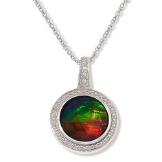 Canadian Ammolite Gems Round Ammolite Pendant with Chain This pretty, round pendant features Canadian Ammolite, a rare, rainbow-colored gem from Alberta, Canada. Its polished, bead-studded sterling silver setting and bail front make it a great choice for chic, everyday wear. By Kenneth Bradley.       Pendant approx. 13/16"L x 9/16"W     Chain approx. 18"L x 1/16"W with 2" extender     Stamped .925; rhodium plating     Round pendant has bezel-set, 10mm round ammolite/quartz triplet     Silver, be Iridescent Round Gemstone Jewelry, Iridescent Gemstone Jewelry, Multicolor Round Jewelry With Bezel Setting, Multicolor Round Bezel Set Jewelry, Multicolor Round Opal Necklaces, Multicolor Opal Round Necklace, Multicolor Round Jewelry With Polished Finish, Multicolor Polished Round Jewelry, Multicolor Jewelry With Bezel Setting