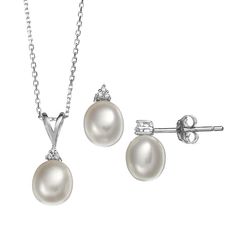 "Accentuated with freshwater cultured pearls and cubic zirconia stones, this pendant necklace and drop earring set adds enchanting appeal to your look. Comes in a gift box. SET DETAILSIncludes: necklace & pair of earringsPendant length: .62 in.Chain length: 18 in.Clasp: spring-ringEarring length: .49 in.Backings: postMetal: rhodium-plated sterling silverCULTURED PEARL DETAILSType: freshwaterShape: dropSize: 7-7.5 mmColor: whiteCUBIC ZIRCONIA DETAILSCut: roundSetting: prongGemstones may have Formal Pearl Drop Jewelry Sets With Cubic Zirconia, Anniversary Jewelry Sets With Pearl Drop And Cubic Zirconia, Classic Teardrop Jewelry Sets For Formal Occasions, Classic Silver Jewelry Sets With Pearl Drop, Formal White Jewelry Sets With Pearl Pendant, Formal White Pearl Pendant Jewelry Set, White Pearl Pendant Jewelry Sets For Anniversary, Pearl White Jewelry Set With Pearl Drop For Anniversary, Anniversary White Pearl Pendant Jewelry Set