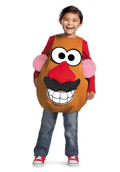 a young boy wearing a costume made to look like a potato head with big eyes