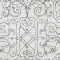 an intricately designed wallpaper in grey and white