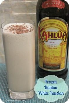 there is a bottle of milk next to a glass filled with ice cream and chocolate