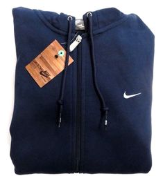 NEW Mens Nike Full Zip Blue Logo Sportswear Sweater Jacket 2008 DEADSTOCK Hoodie NIKE High quality Nike 2008 DEADSTOCK (with original tags) logo hoodie.  Sold Out - Rare Nike Hoodie - No longer Made Deadstock Buy this brand new rare, no longer made 2008 Nike deadstock hoodie with confidence, sure to please. Condition: New with tags  Size: Many sizes available - choose one Material: 65% premium cotton | 35% Polyester  Measurements:   - MED: Chest = 22 inches | Length = 29 inches  - LG: Chest = 24 Vintage Nike Sweatshirt, Nike High, Rare Nikes, Jacket Hoodie, Nike Sweatshirts, Nike Basketball, White Nike, Blue Logo, Blue Nike