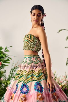 Experience the mesmerizing blend of vibrant hues with this stunning lehenga, crafted in a multi-tropical print and highlighted with intricate beadwork. The corseted blouse features delicate, handcrafted detailing. Bollywood Style Multicolor Hand Embellished Choli, Traditional Hand Embellished Multicolor Sets, Festive Hand Embellished Multicolor Sets, Multicolor Hand Embellished Lehenga For Party, Designer Multicolor Hand Embellished Choli, Multicolor Hand-embellished Lehenga For Party, Multicolor Hand Embellished Choli For Parties, Designer Hand Embellished Multicolor Choli, Multicolor Hand Embellished Choli For Festivals