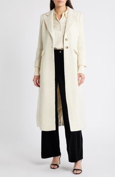 Full of warmth and polish, this woolly longline coat is crafted with cozy wide ribbing at the cuffs and hem. 47" length (size Medium) Front button closure Notched lapels Ribbed cuffs and hem 60% polyester, 40% wool Dry clean Imported Timeless White Wool Outerwear, White Timeless Wool Outerwear, Timeless Long Sleeve Cream Outerwear, Timeless Cream Long Sleeve Outerwear, Timeless Cream Winter Outerwear, Classic Long Cream Outerwear, Classic Cream Wool Sweater Coat, Cream Long Wool Outerwear, Classic Long Wool Coat In Winter White