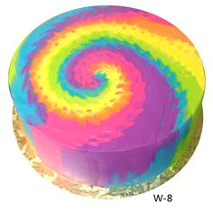 a multicolored cake on a white background