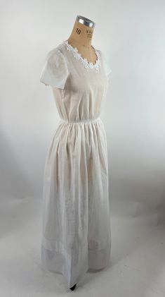 Cotton Empire Waist Wedding Dress, Sheer Empire Waist Wedding Dress, Modest White Dress With Lace Trim, Elegant Cotton Dress For Wedding Night, Short Sleeve Maxi Dress With Lace Trim For Weddings, White Sheer Maxi Dress For Daywear, Wedding Maxi Dress With Lace Trim And Short Sleeves, Regency Style White Dress With Lace Trim, Long Dress Simple