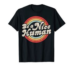 a black t - shirt that says be a nice human