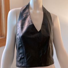 Awesome Genuine Black Leather Halter Top With Zip Closure And Stretch Sides. Fully Lined. See Photos For Description. Nwot Two Sizes Available - L & Xl Black Fitted Biker Top, Fitted Sleeveless Biker Top, Leather Halter Top, Leather Halter, Halter Top, New Black, Black Leather, Genuine Leather, Womens Tops