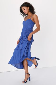 Get ready to be swept away to a world of romance by the Lulus Cascading Crush Cobalt Blue Tiered Bustier Midi Dress! Lightweight pleated woven fabric shapes adjustable spaghetti straps that support a bustier-style bodice with seamed cups. A fitted waist tops a tiered skirt that ends at a midi hem. Hidden back zipper/clasp. Fit: This garment fits true to size. Length: Mid-calf length. Size medium measures 44.5" from adjustable straps to hem. Bust: Great for any cup size. Waist: Fitted - very fitt