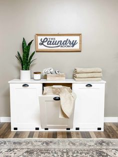 the laundry room is clean and ready to be used as a storage area for towels