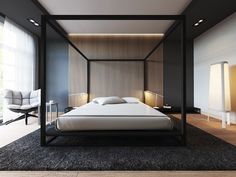 a modern bedroom with a canopy bed in the middle and two lamps on either side