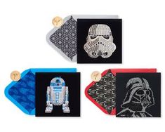 four star wars themed coasters with different designs on them, including a r2d2 and c - 3po