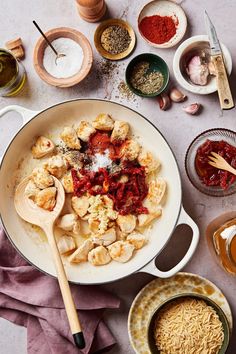 the food is prepared and ready to be cooked in the pot on the counter top