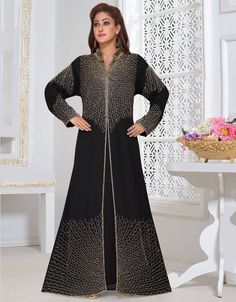 Subhanallah Party Wear Jacket Style Kaftan 👗 Buy latest Kaftan which are made up from best quality fabrics with latest styles from our large collections at https://bit.ly/3eafqPe Shop Now : https://bit.ly/3vNbL0Z Buy online @ $114.95 #kaftandresses #kaftandress #kaftanforwomen #caftanloungewear #longkaftandress #arabicattire #caftan Traditional Sequined Kaftan With Traditional Drape, Traditional Sequined Kaftan With Drape, Traditional Evening Kaftan With Sequins, Festive Long Sleeve Embellished Abaya, Eid Floor-length Sequined Kaftan, Bollywood Style Embellished Maxi Length Kaftan, Bollywood Style Embellished Maxi Kaftan, Long Sleeve Abaya With Intricate Embroidery For Party, Intricate Embroidered Long Sleeve Abaya For Parties