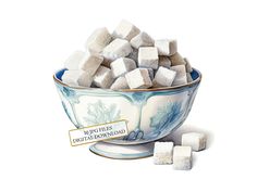 a bowl filled with marshmallows on top of a table