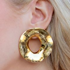 This fabulous elevated basic earring by Accessory Concierge is perfect for dinner out or to dress up any look. Hammered gold plated stainless steel. Measure about 2" long and 2" wide. Gold Hammered Earrings For Party, Elegant Hammered Hoop Earrings For Party, Chic Hammered Metal Earrings, Chic Gold Hammered Earrings, Gold Metal Plug Earrings, Elegant Hammered Gold-tone Earrings, Luxury Hammered Brass Earrings, Girls Chandelier, Luxury Brass Drop Earrings