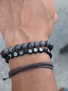 Men's Motivational Lava Rock Diffuser Bracelet by Cappa Creations - Stretchy, Black Beads, Essential Oil Diffuser Jewelry Personalized Casual Bracelets For Everyday, Casual Personalized Bracelets For Everyday, Casual Personalized Everyday Bracelets, Casual Adjustable Name Bracelet, Inspirational Black Bracelets For Everyday, Adjustable Personalized Bracelets For Meditation, Customizable Black Friendship Bracelets For Everyday, Adjustable Personalized Bracelets, Customizable Black Friendship Bracelets