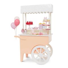 an ice cream cart with balloons and cake on it