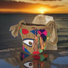 Georgia medium Handmade Punch-needle Wayuu Mochila Bag - a perfect gift for her Traditional Multicolor Bucket Bag For Daily Use, Multicolor Woven Bucket Bag As Gift, Multicolor Fair Trade Shoulder Bag As Gift, Multicolor Woven Bucket Bag For Travel, Artisan Bucket Bag For Festivals, Multicolor Handwoven Bucket Bag As A Gift, Bohemian Multicolor Bucket Bag Gift, Traditional Multicolor Crochet Bag For Gift, Traditional Multicolor Crochet Bag As Gift