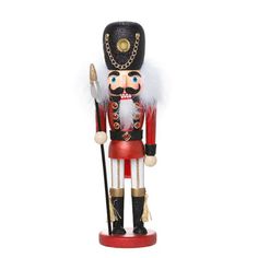 a red and white nutcracker figurine with a black hat on it's head