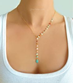 "Peruvian Opal & Turquoise Necklace This necklace is made with real bright multi color peruvian opal and turquoise - Attached are genuine opal gemstones and turquoise. (Turquoise teardrop stone measures about 11 - 13 mm) - Chain is sparkly 14k gold fill or sterling silver - Necklace is shown at 18\" length - The length measurement does not include the dangle section - The drop section after the Y is approx 2 1/2 inches additional length - The tiny gemstones are unique and will vary in color Opal Necklaces, Opal Necklace Gold, Unique Beaded Jewelry, Women's Necklace, Chula Vista, Peruvian Opal, Handmade Wire Jewelry, Trik Fotografi, Opal Necklace