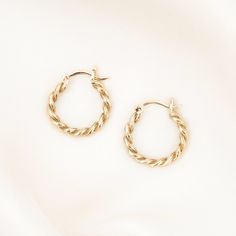 Our Rope Hoop Earrings feature a sweet, eye-catching feminine design. These hoops were thoughtfully made with enhancing your classic hoops in mind. When you are wanting something a little more than your everyday hoops, these are it! DETAILS 14k gold vermeil -or- sterling silver hoops Hoops measure 18 x 20mm Comes as a pair Safe for sensitive skin & shower safe Flower Cuff Bracelet, Twist Hoop Earrings, Love Knot Ring, Pearl Chain Necklace, Detailed Necklace, Hoops Gold, Earrings Hoops, Solid Gold Earrings, Hoop Earrings Gold