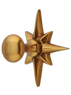 a gold door knob with a star design on it