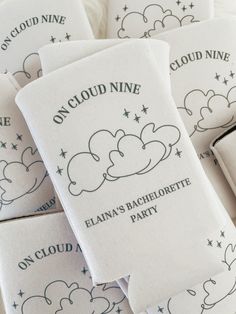 cloud nine bachelor party napkins are stacked on top of each other