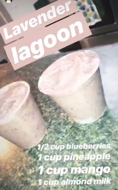 two drinks sitting on top of a counter with the words lavender lagoon written above them