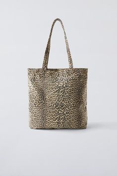 ANIMAL PRINT TOTE BAG - Black | ZARA United States Animal Design Tote Shoulder Bag For Daily Use, Rectangular Leopard Print Bags For Daily Use, Daily Use Animal Design Tote Shoulder Bag, Animal Design Shoulder Bag For Daily Use, Trendy Animal Design Bags For Daily Use, Leopard Print Travel Bag With Animal Design, Animal Design Tote Bag For Daily Use, Leopard Print Rectangular Shopping Bag, Black Animal Design Satchel Bag