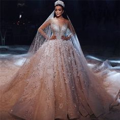 a woman in a wedding dress on the runway